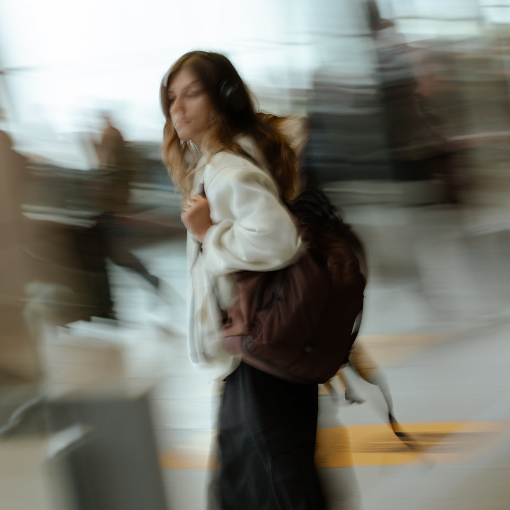 blurred image of person in airport
