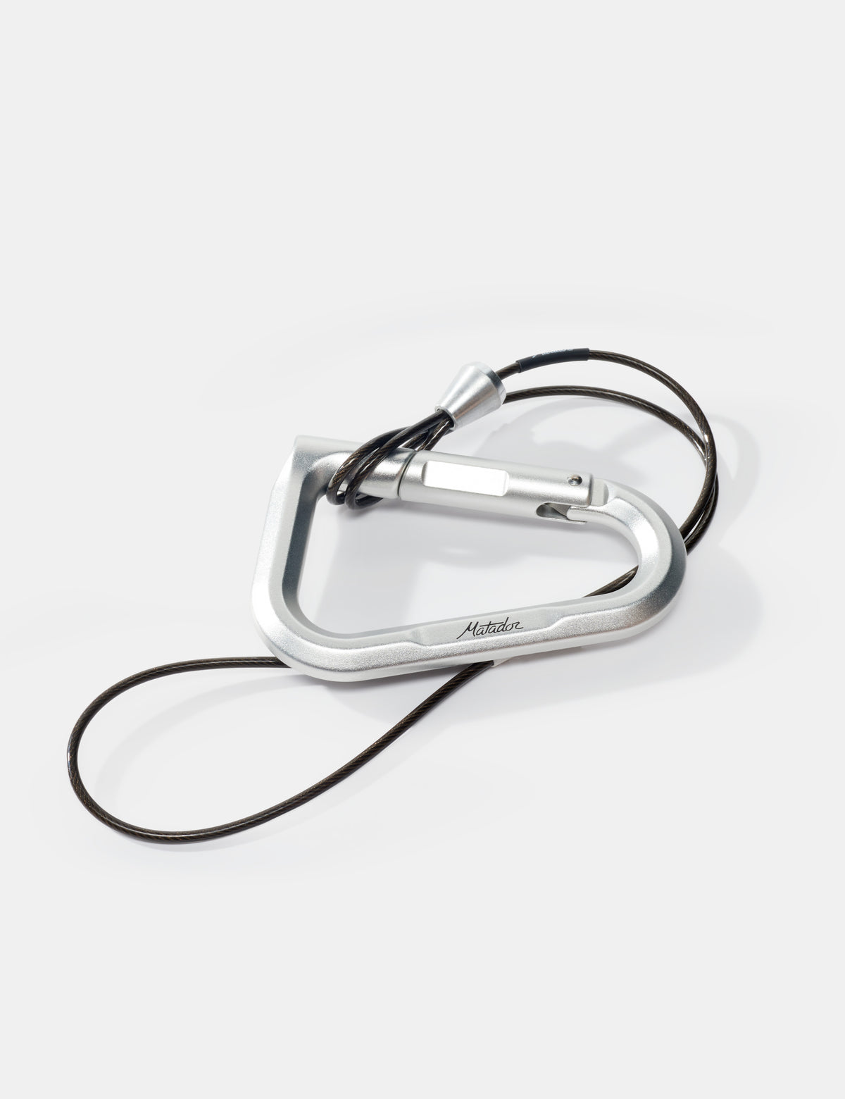 Silver carabiner with a black cord on a white background