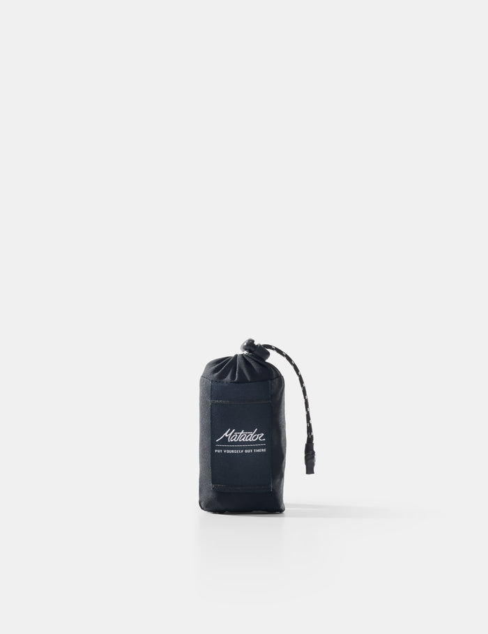 Black drawstring pouch with brand logo on a white background