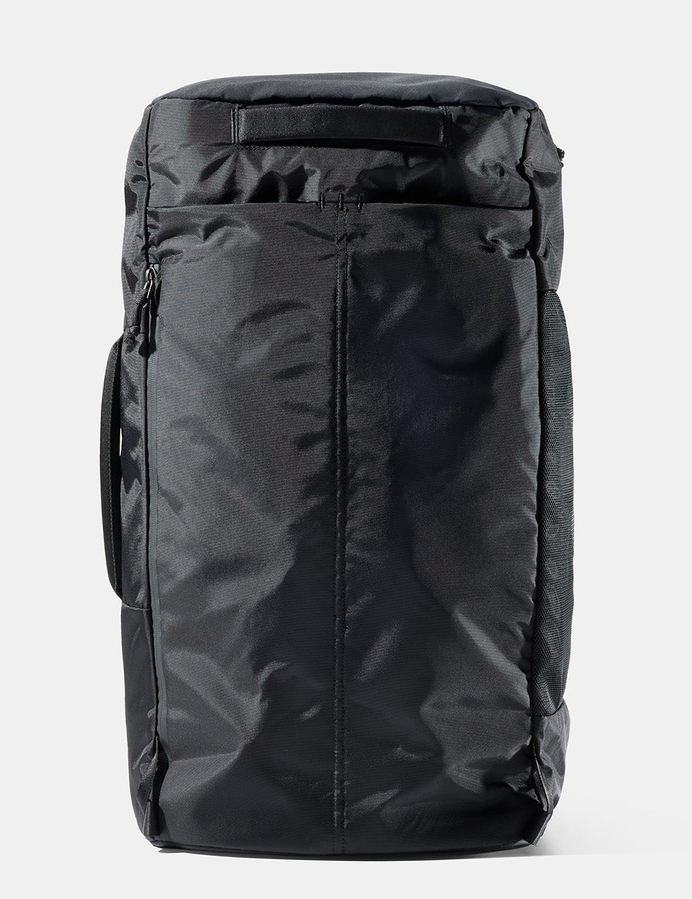 stowed shoulder straps on black backpack