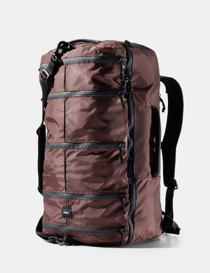 Garnet backpack with black straps on a white background