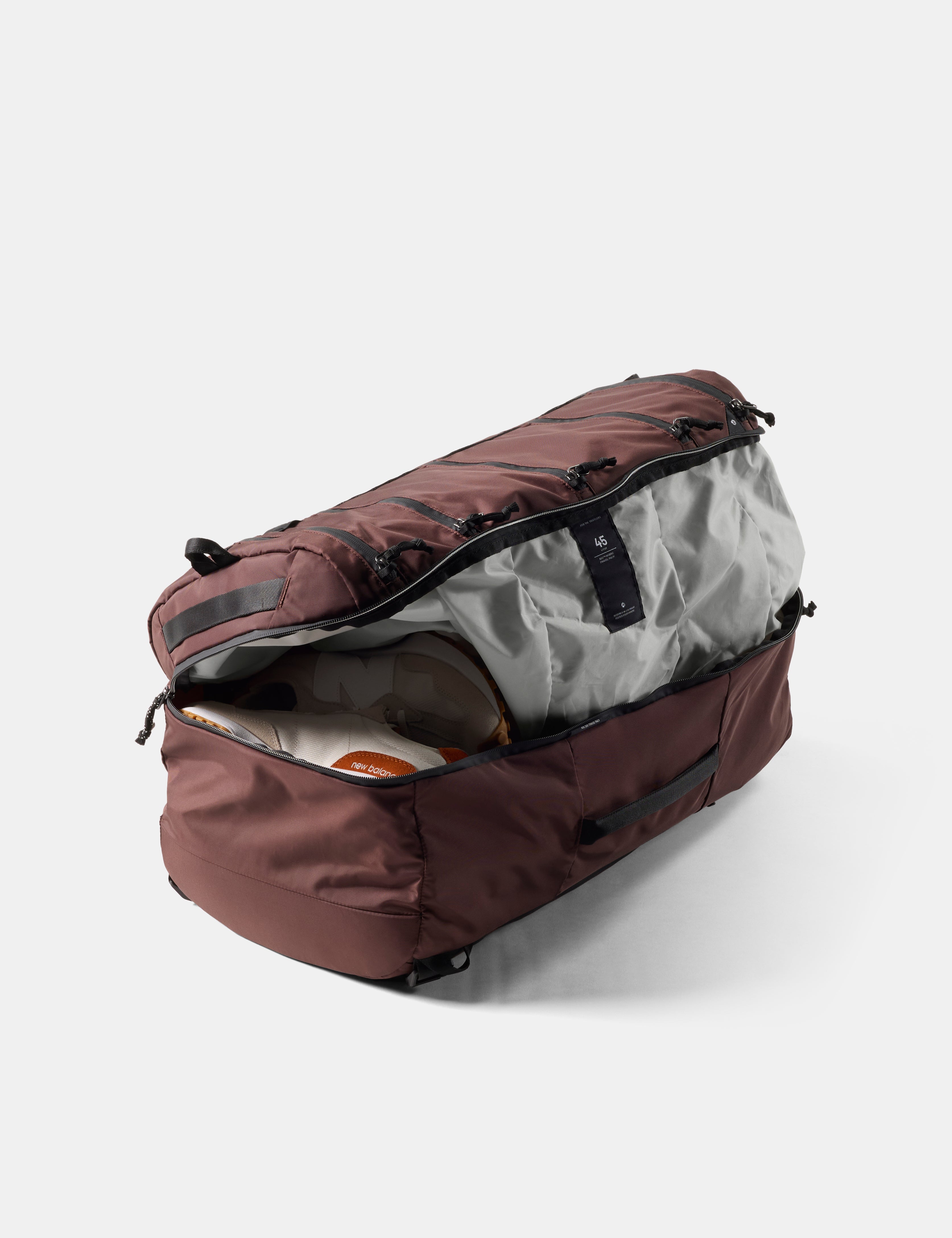 Garnet  duffel bag with open compartment on a white background