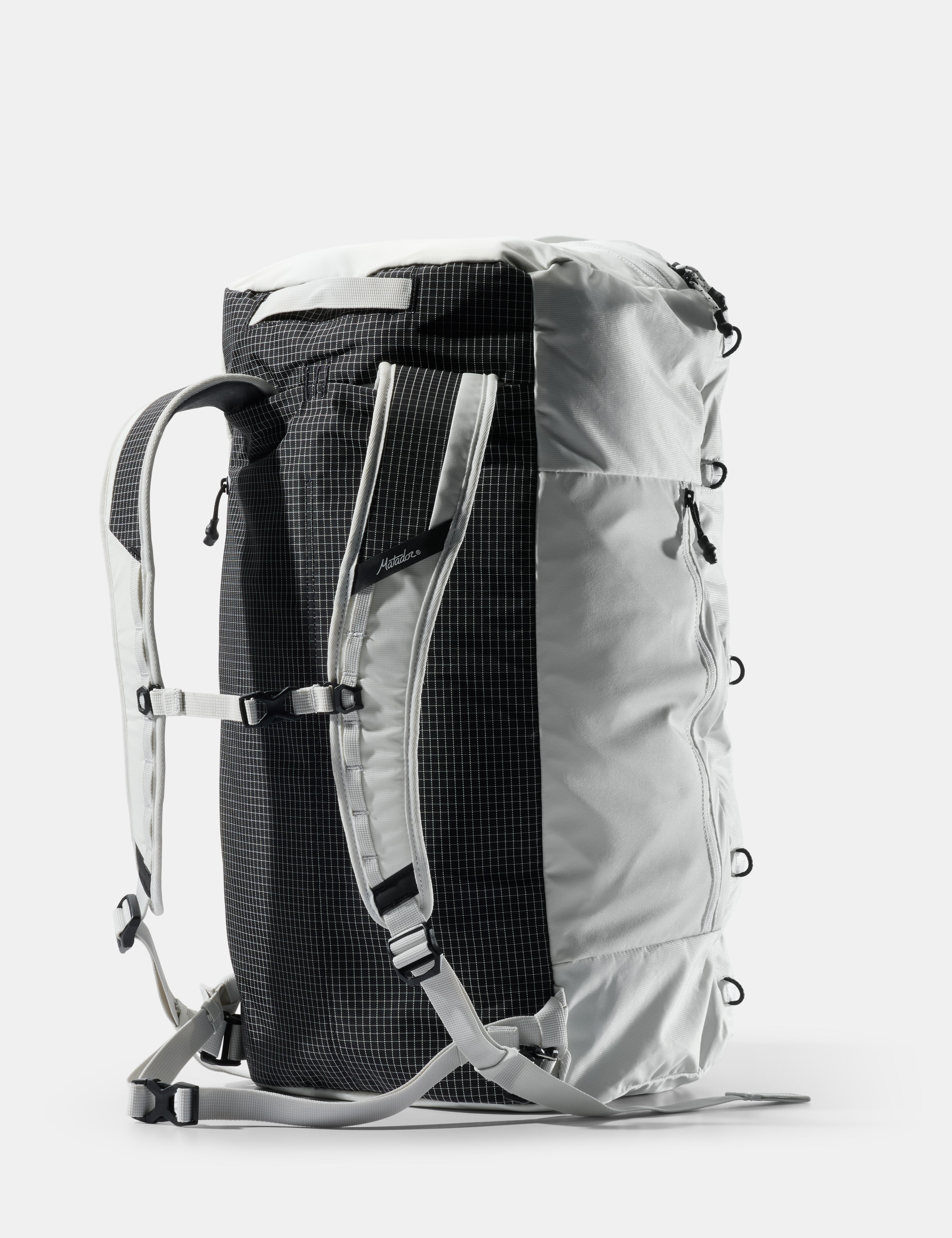 Gray and black backpack on a white background