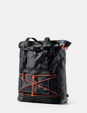 Black backpack with orange accents on a light gray background