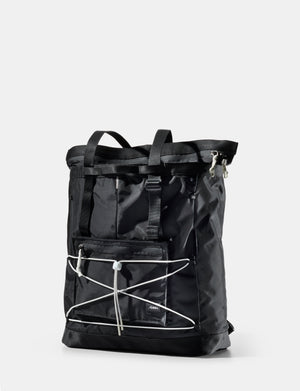 Black tote with white accents on a light gray background