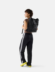 Person wearing a black bag on a white background