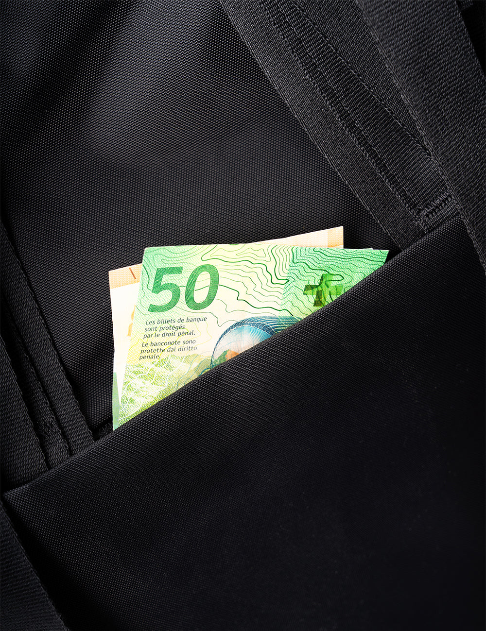 money coming out of secret pocket