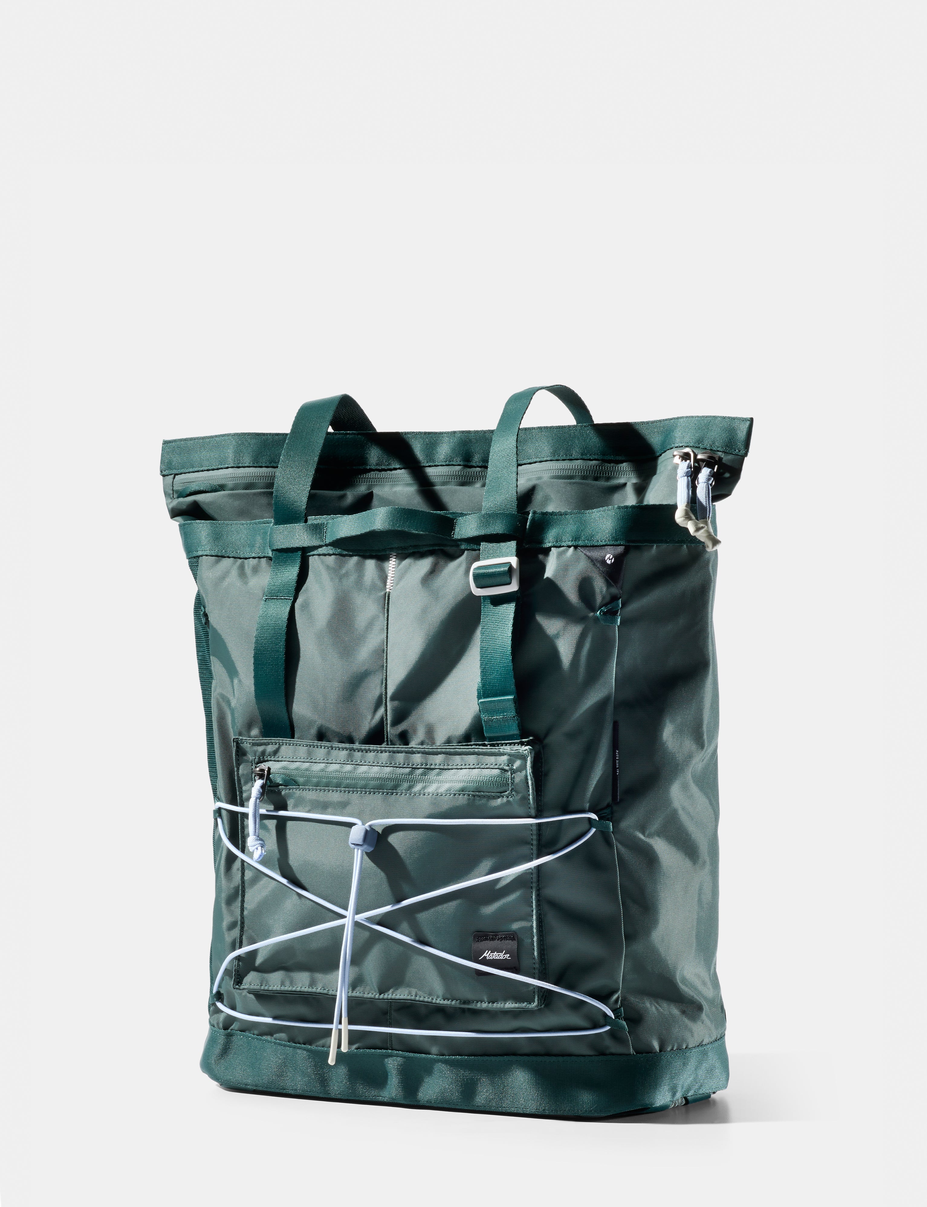 Green backpack with a white background