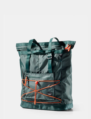 Green backpack with orange accents on a white background