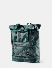 Green tote bag with multiple pockets on a white background