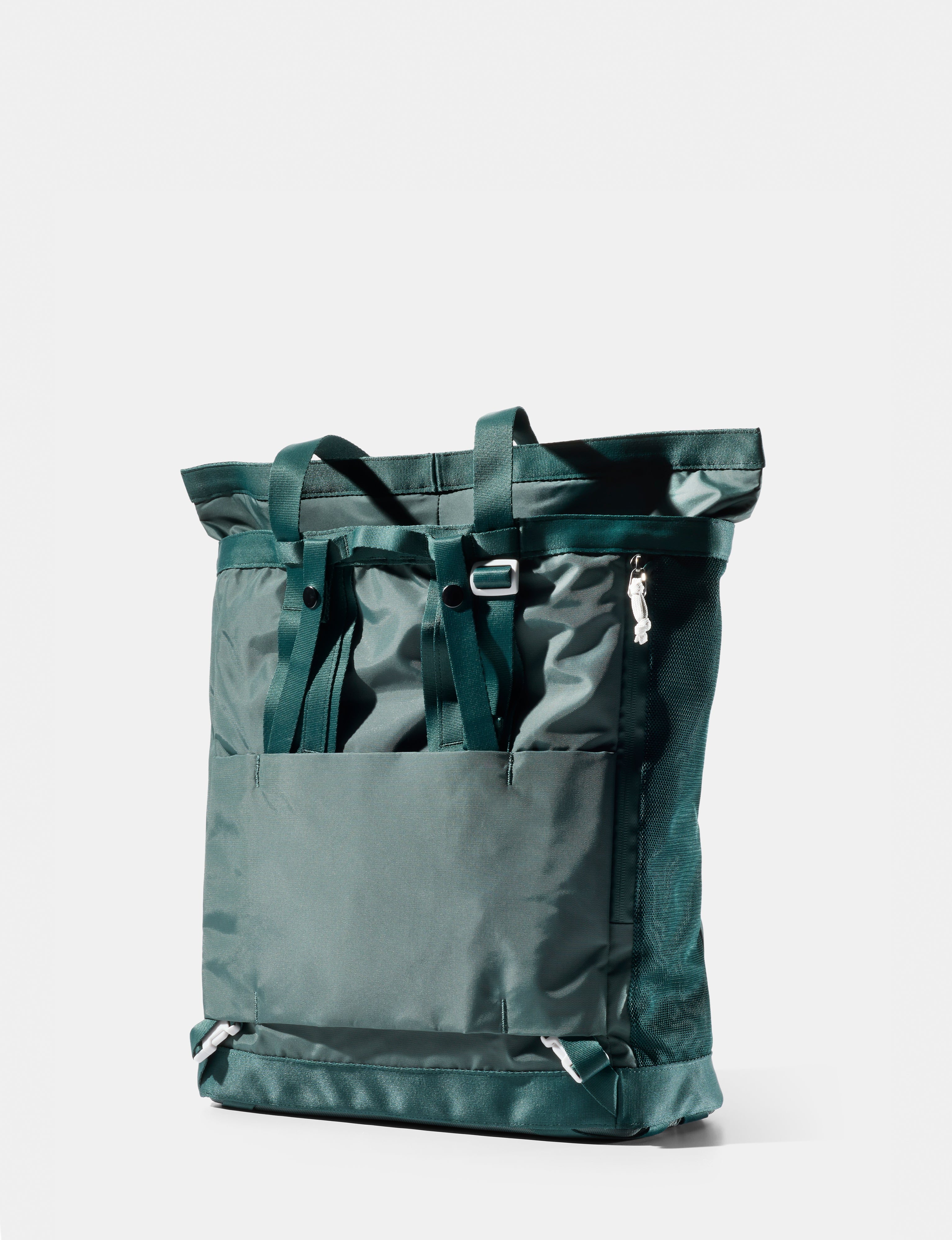 Green tote pack on a white background