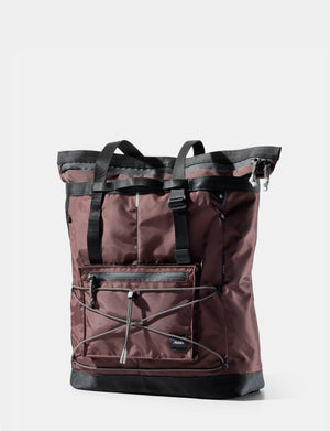garnet tote with black accents on a white background
