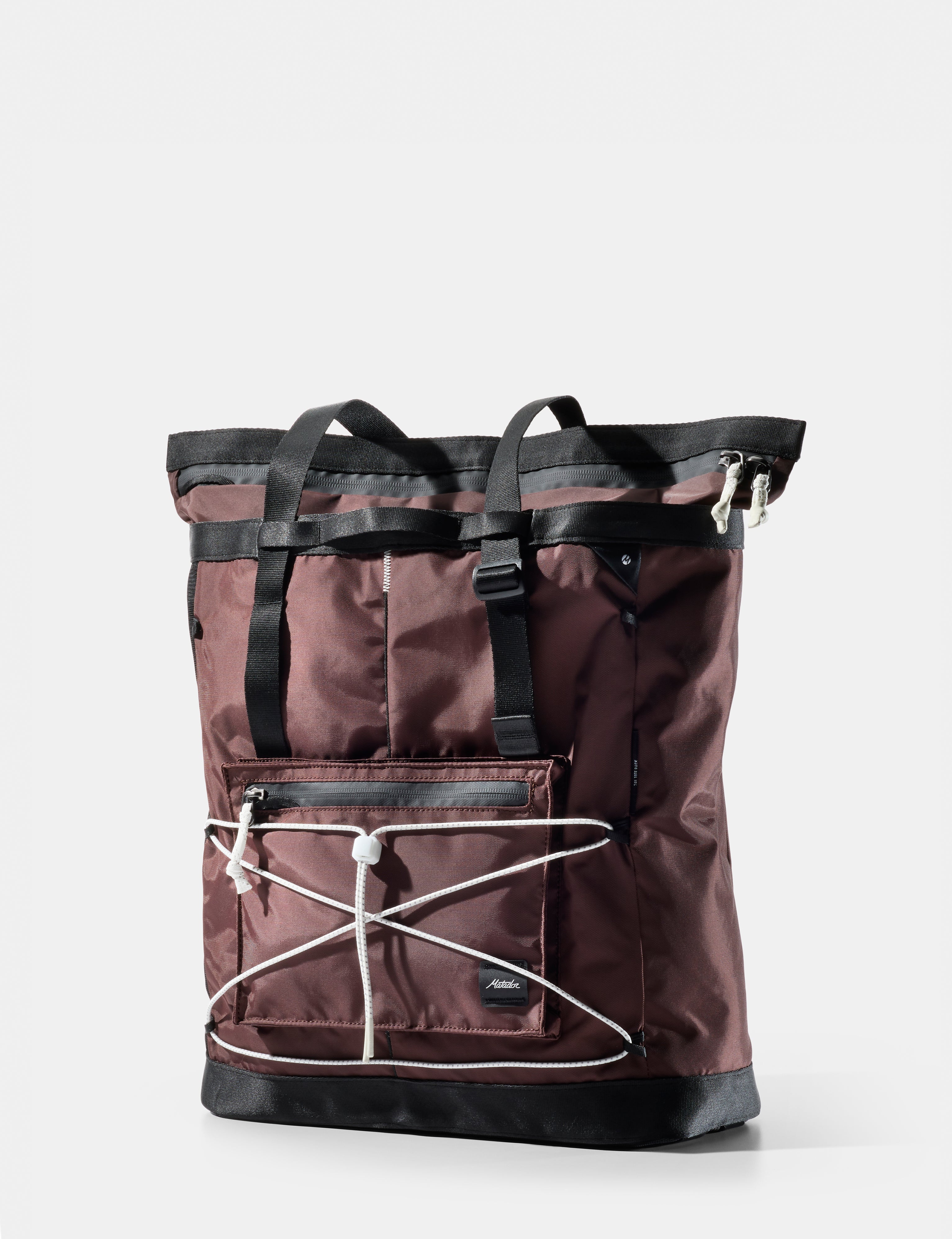 garnet tote with black accents on a white background