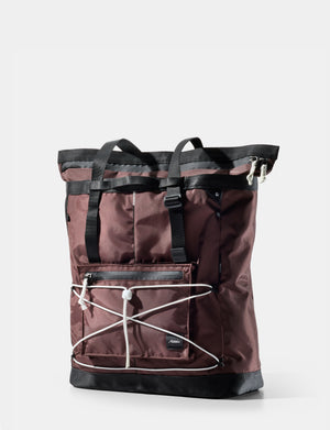 garnet tote with black accents on a white background