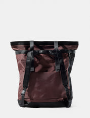 garnet  backpack with black straps on a white background