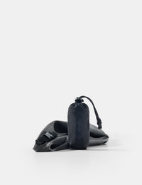 gray towel and pouch on a white background