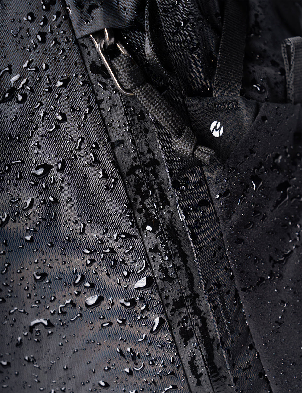water drops on black fabric