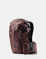 garnet backpack and its compact folding version on a white background