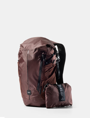 garnet backpack and its compact folding version on a white background