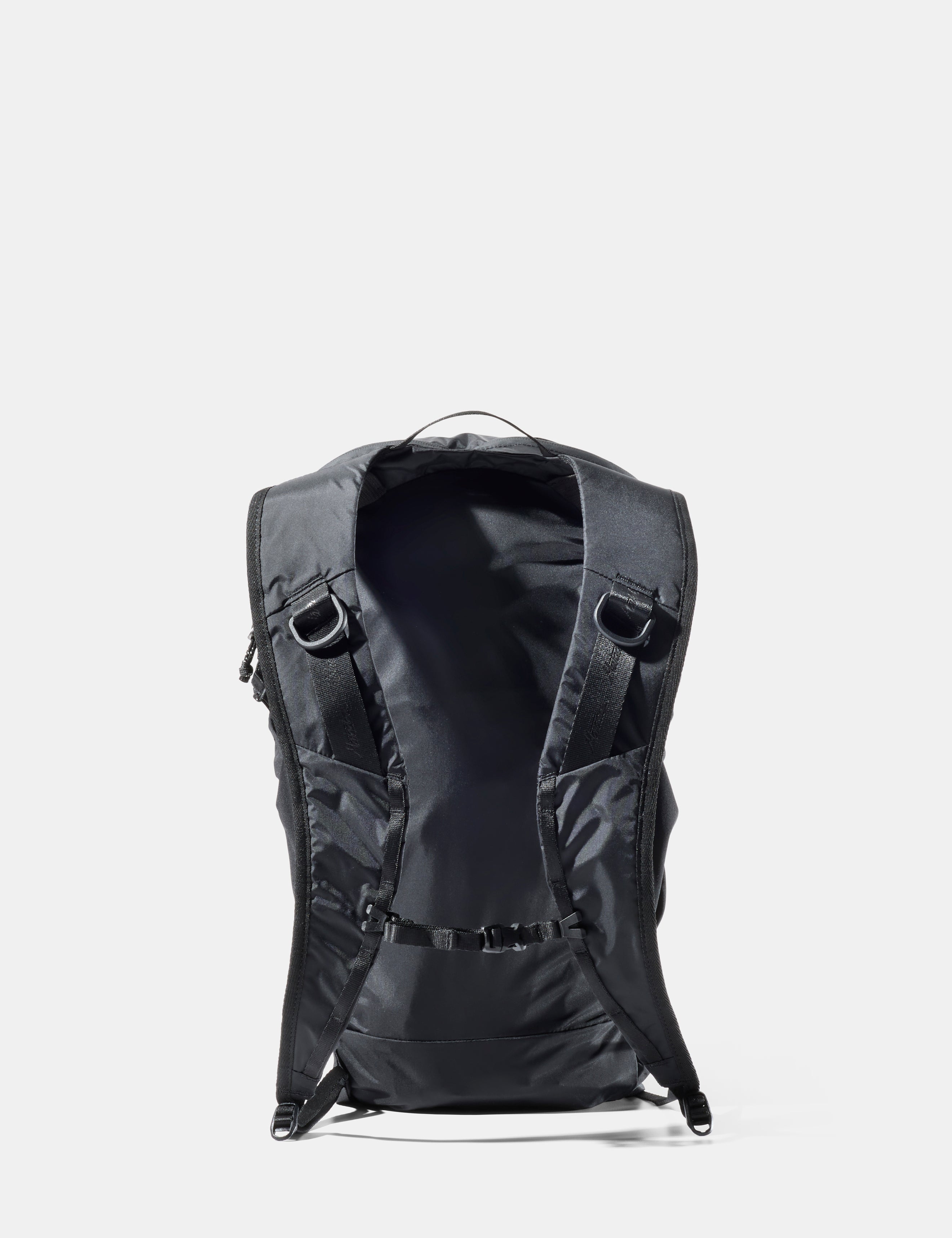 Black backpack on a white background