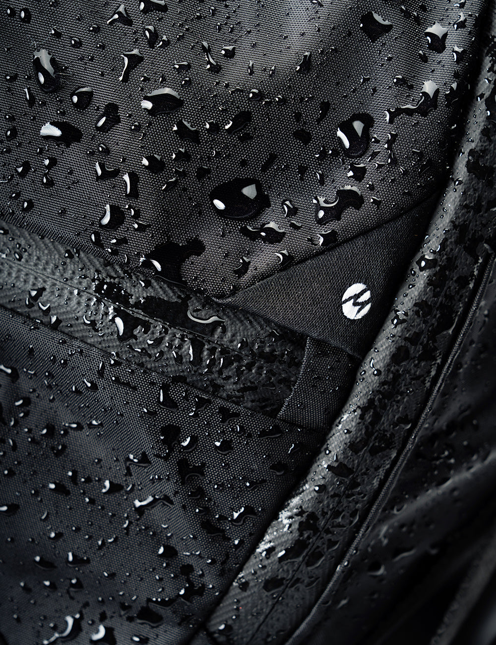water droplets on black fabric
