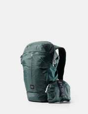 Green backpack with a smaller pouch on a white background