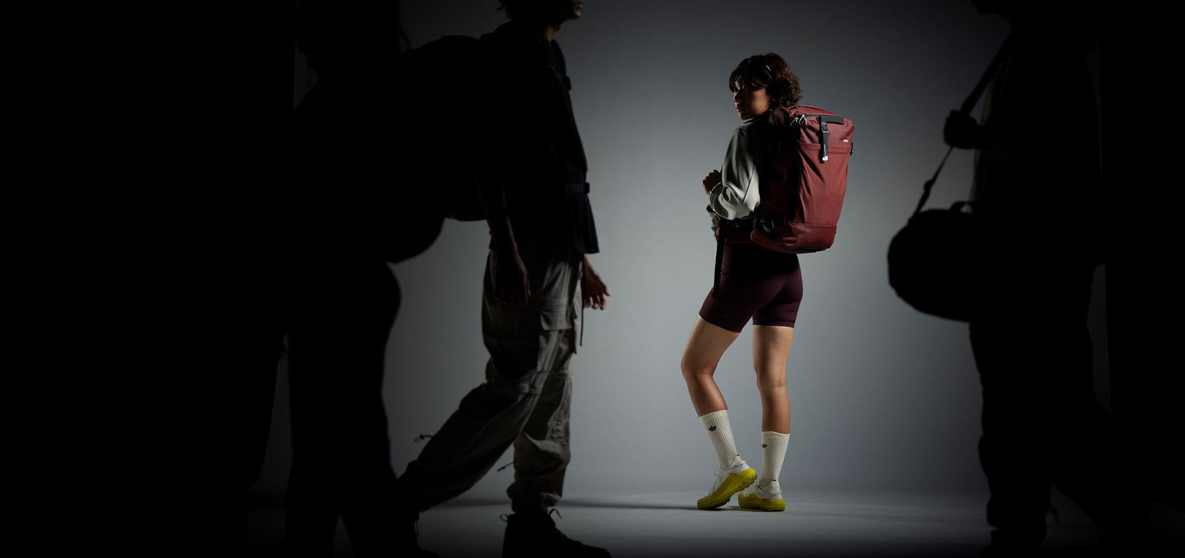 a girl with matador glober rider 35 travel backpack