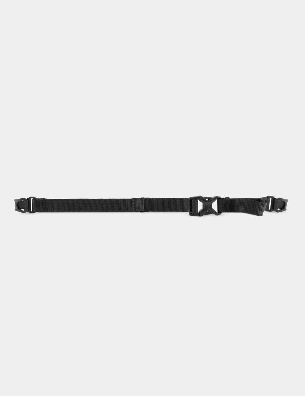 black sternum strap piece on light gray background