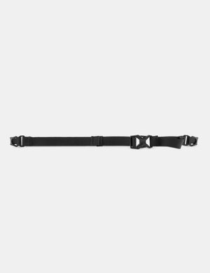 black sternum strap piece on light gray background