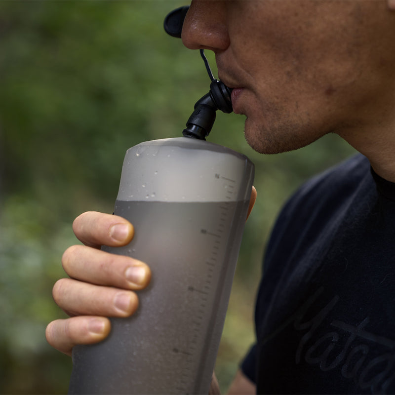 Man drinking from Packable Water Bottle