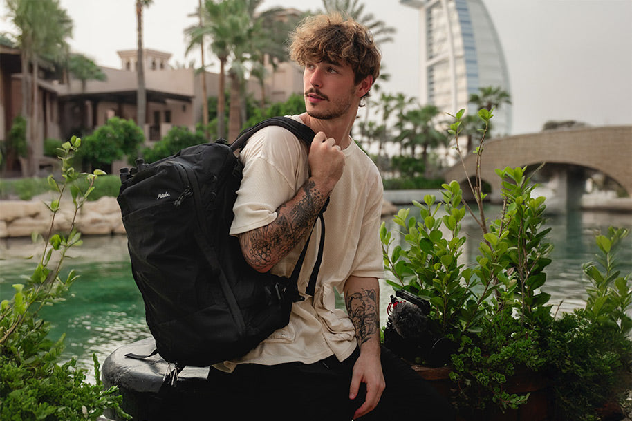 person wearing a GlobeRider35 travel backpack in Dubai