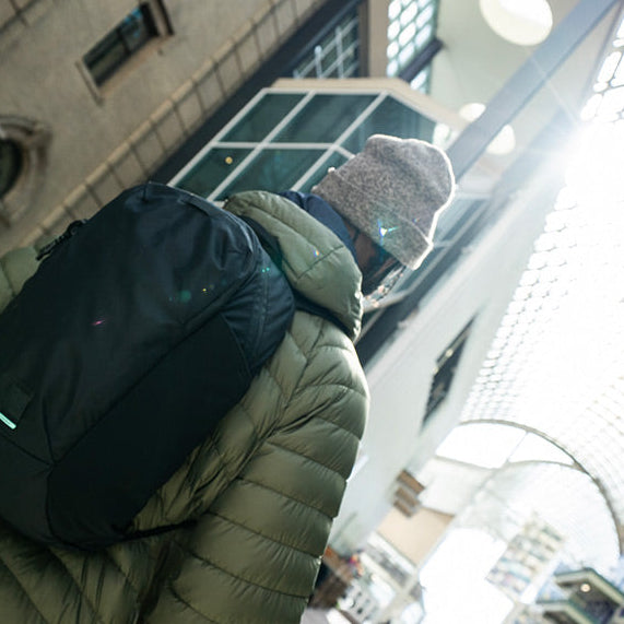 guy wearing a backpack outside