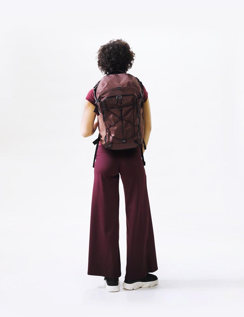 video of person wearing garnet backpack