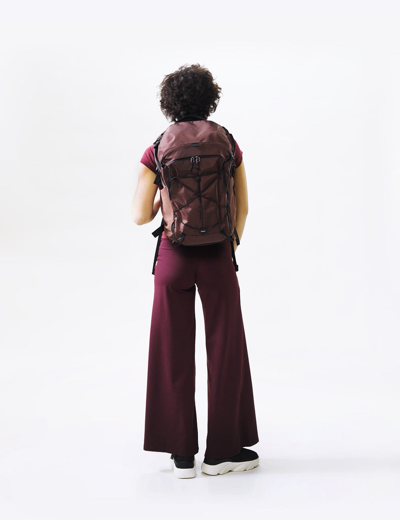 video of person wearing garnet backpack