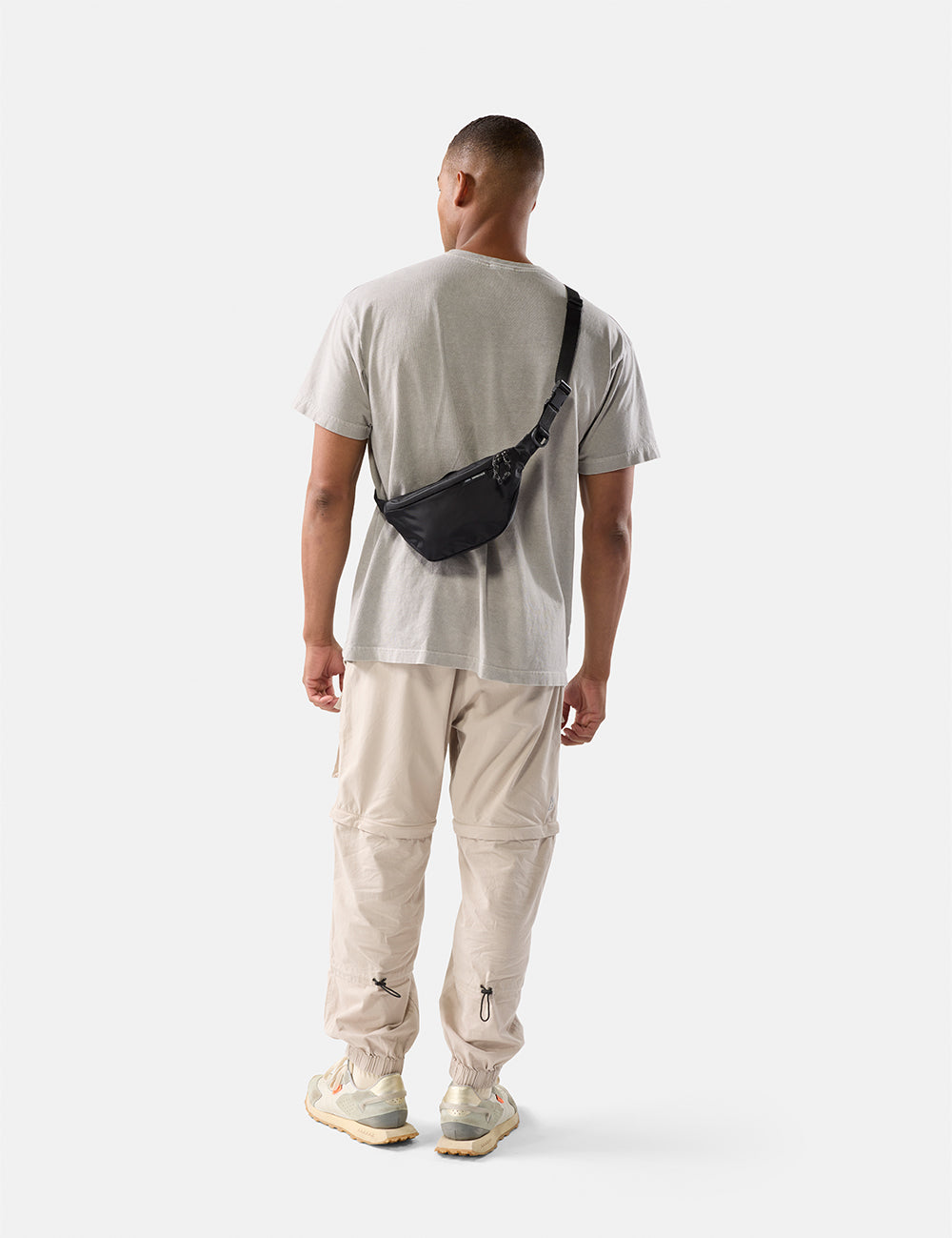 video of man wearing black sling