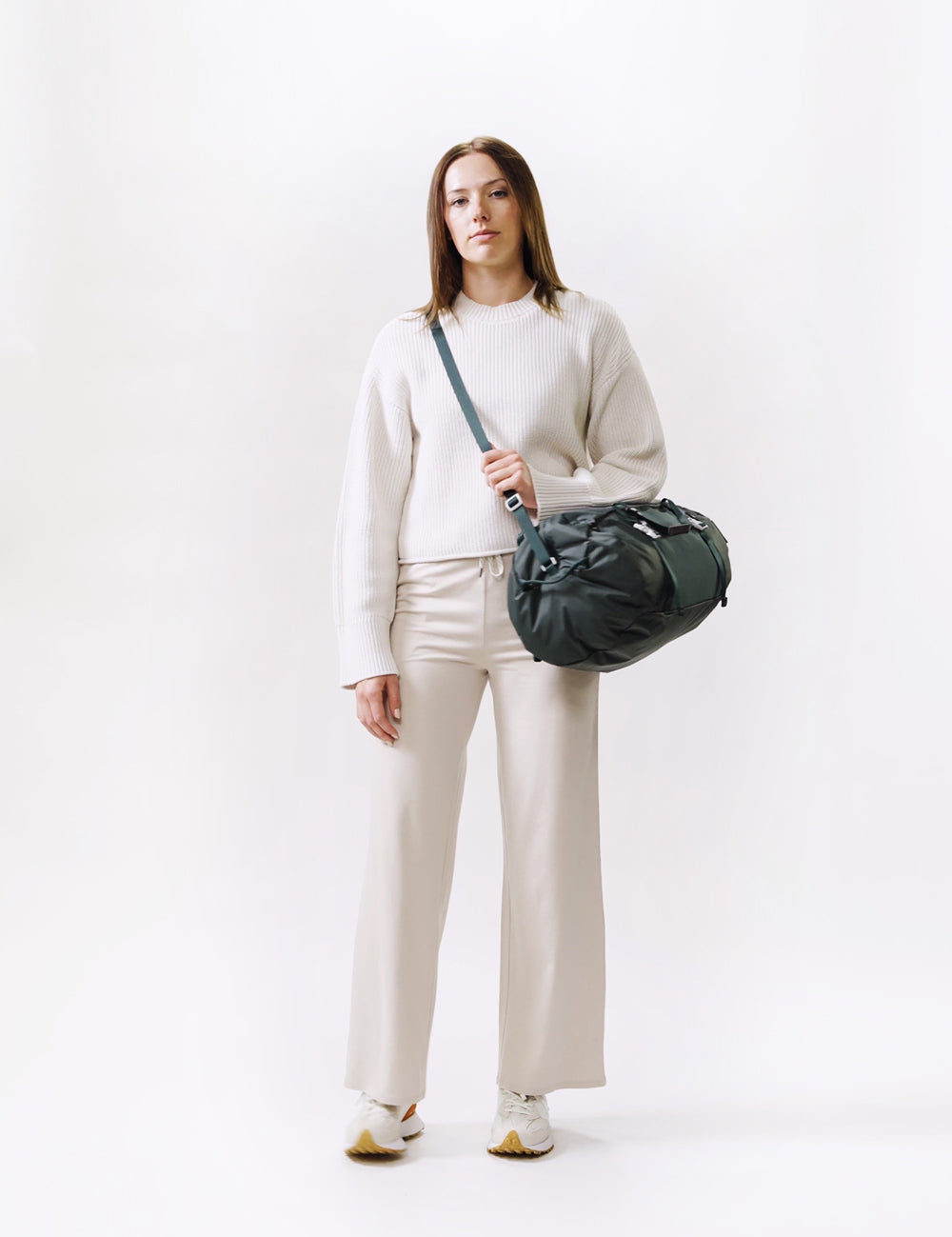 video of woman wearing juniper duffel