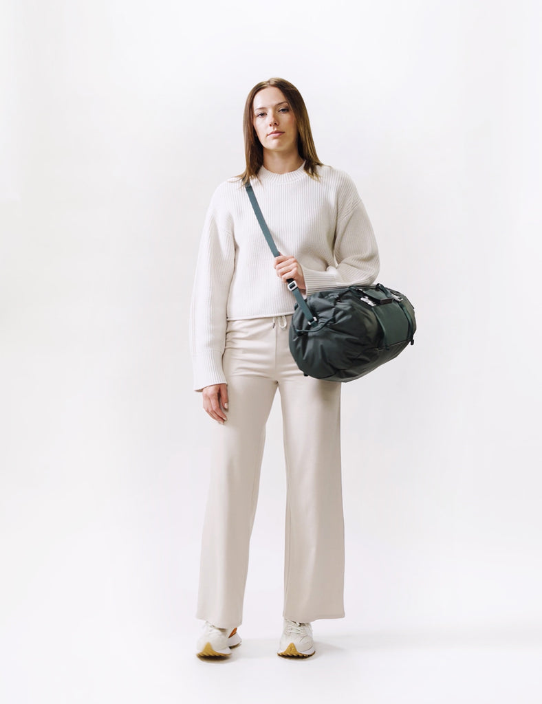 video of woman wearing juniper duffel