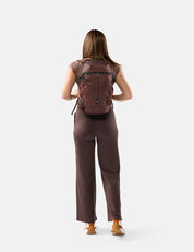 video of woman wearing garnet bag