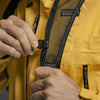 Close up view of man adjusting sternum strap
