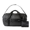 Full duffel with small pouch on white background