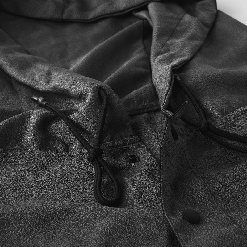 close up view of neck details and snaps on charcoal poncho