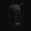 3/4 view of backpack on black background
