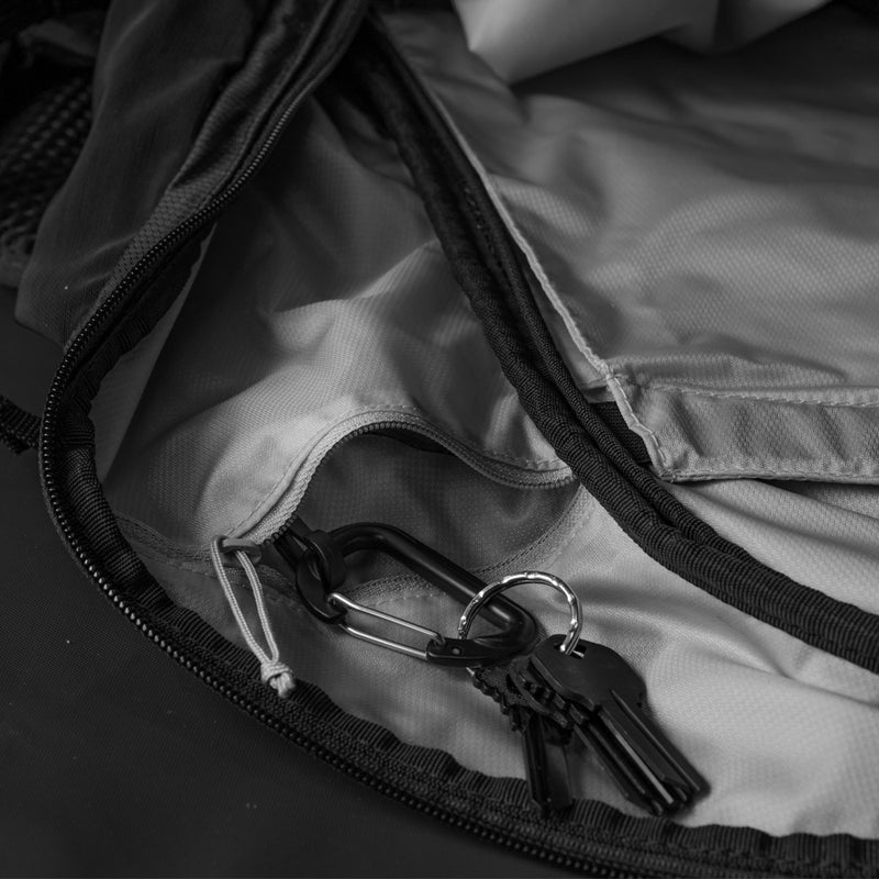 Close up view of keys hanging from internal backpack pocket