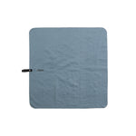 Flatlay view of Slate Blue NanoDry Trek Towel on white background