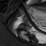 Close up view of keys attached to interior zipper pocket