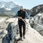 Man walking across an Alaskan glacier 