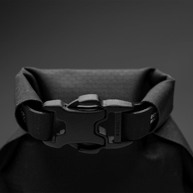 Close up view of roll top buckle
