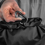 close up view of carabiner being clipped to D ring tether point