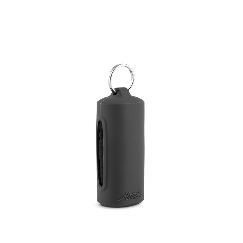 Black silicone keychain case on white background