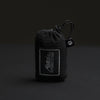 Packed down pocket blanket on black background